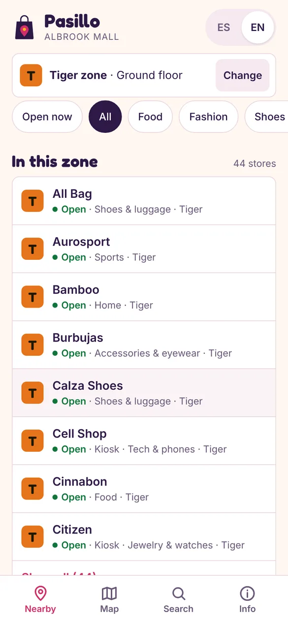 A Pasillo guide on a phone: stores in one area, open now